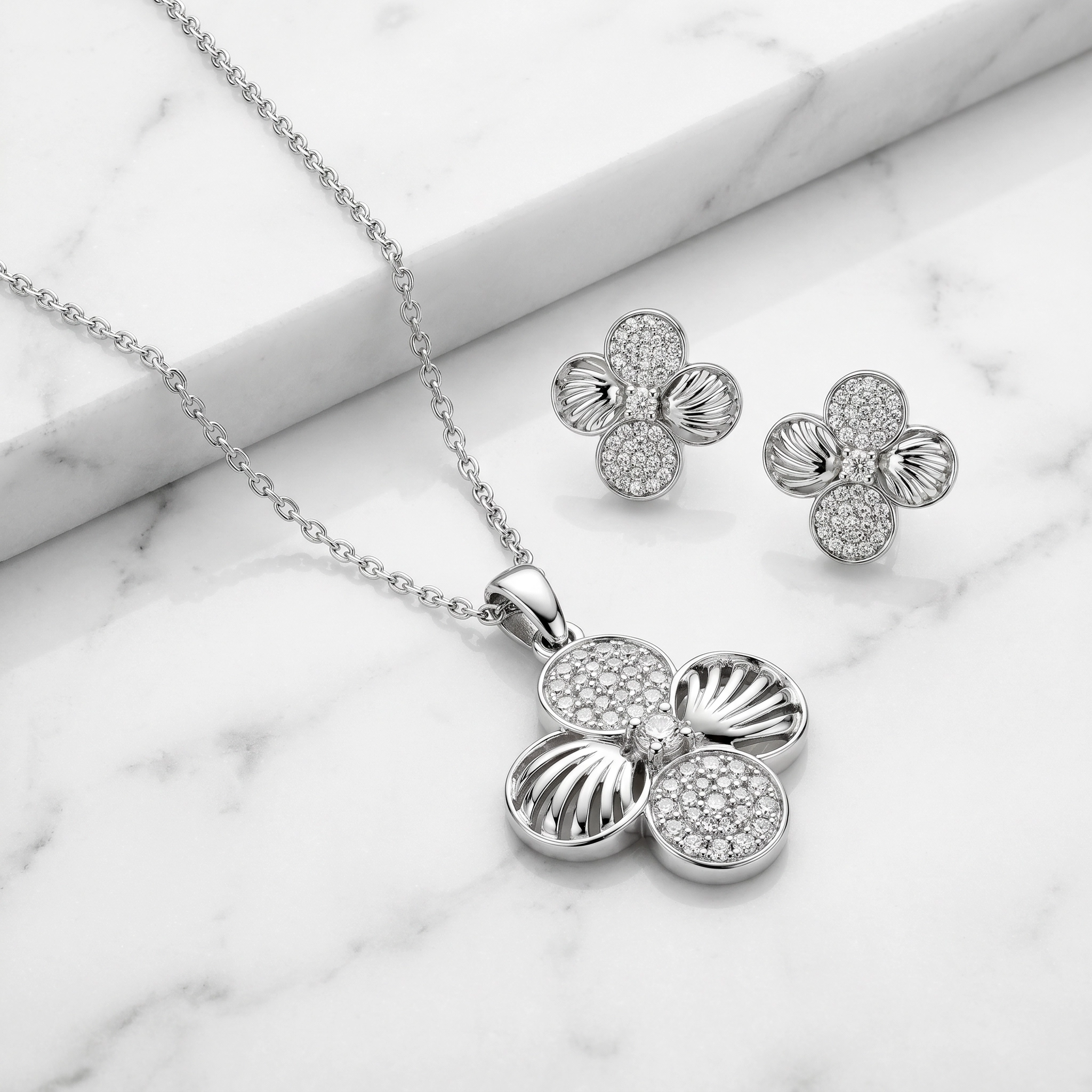 ✨ Silver Blossom Floral Pendant & Earrings Set